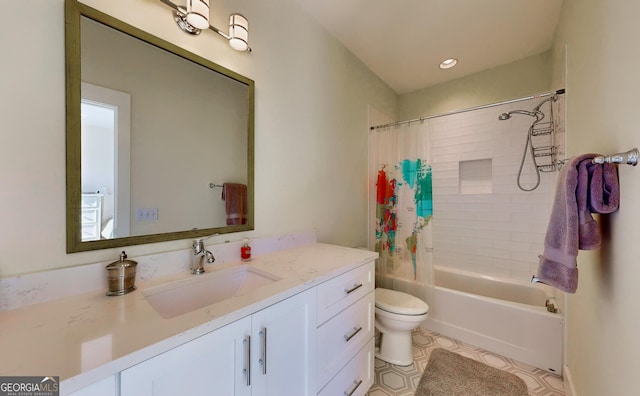 full bathroom featuring vanity, shower / bath combination with curtain, and toilet