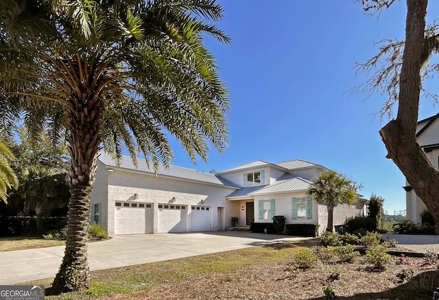 view of front of property featuring a garage