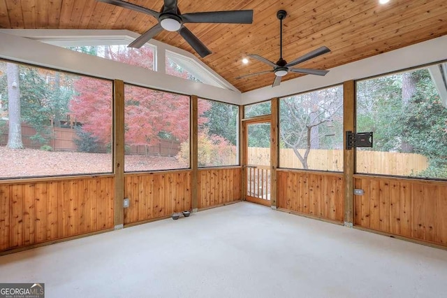 unfurnished sunroom with ceiling fan, wood ceiling, and lofted ceiling