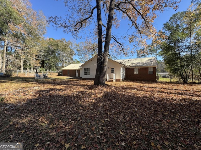 exterior space featuring fence