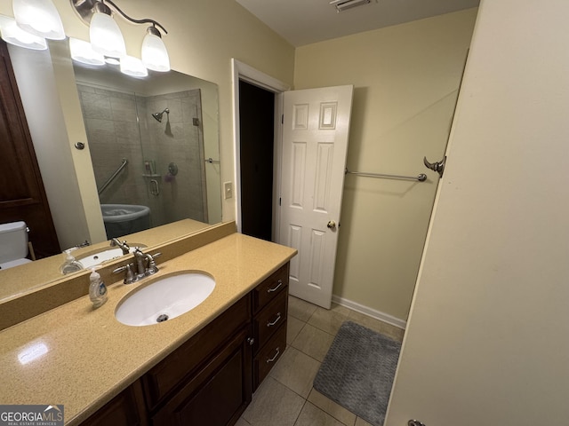 full bathroom with visible vents, toilet, a stall shower, tile patterned flooring, and vanity