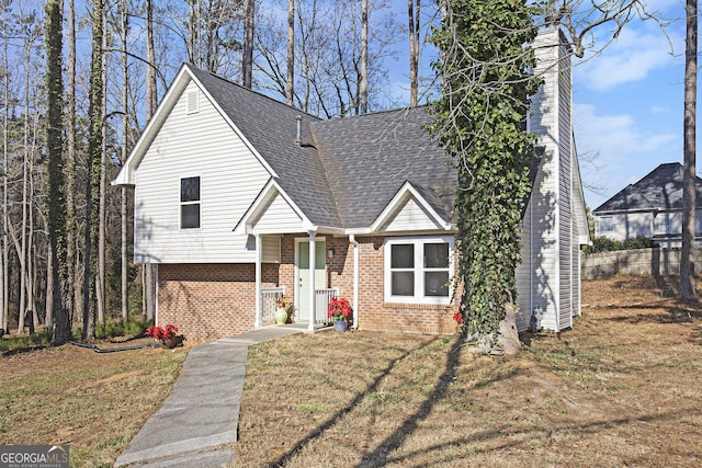 view of front of house with a front lawn