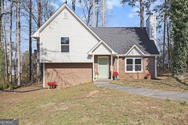 view of front of house with a front lawn