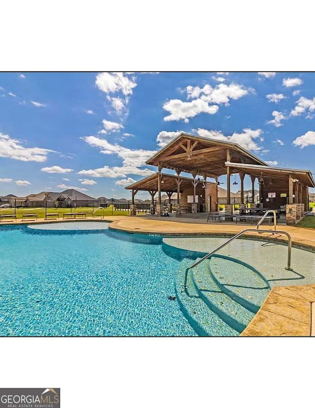 view of pool with a patio