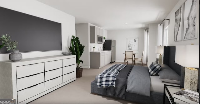 bedroom featuring stainless steel fridge