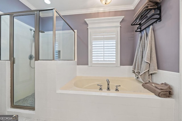 bathroom featuring plus walk in shower and ornamental molding