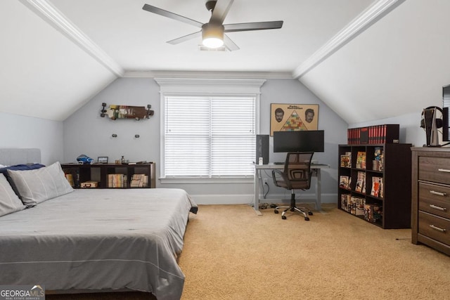 bedroom with ceiling fan, light colored carpet, lofted ceiling, and ornamental molding