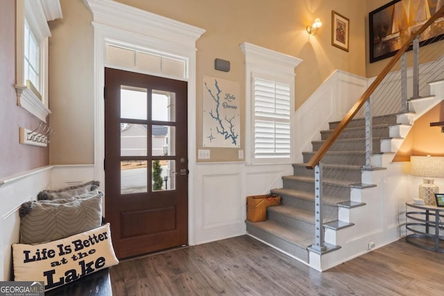 foyer entrance featuring wood-type flooring