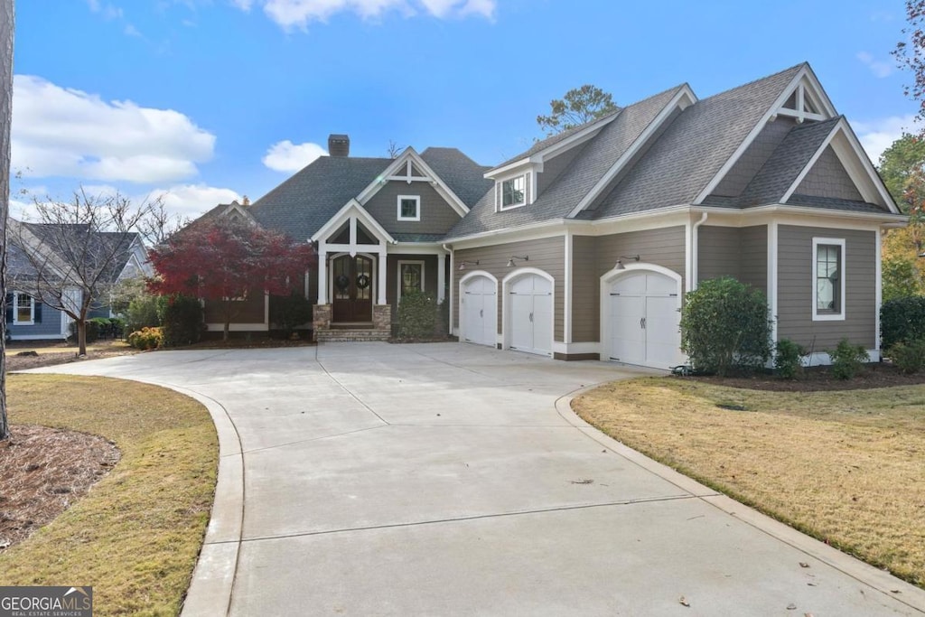 craftsman house with a front yard