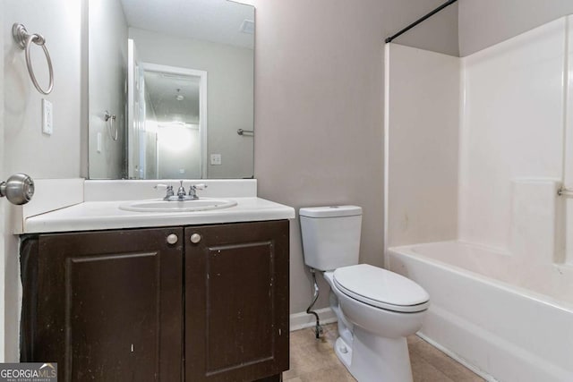 full bathroom with tile patterned floors, vanity, bathing tub / shower combination, and toilet