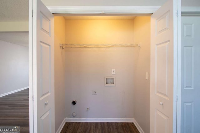 laundry area with washer hookup, electric dryer hookup, dark hardwood / wood-style flooring, and hookup for a gas dryer