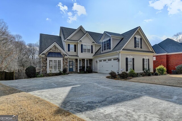 view of front of property featuring a garage