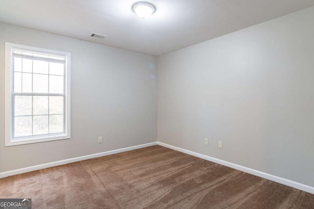 view of carpeted spare room