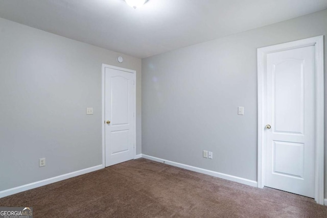 empty room with carpet floors