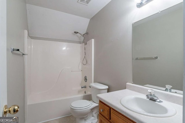 full bathroom featuring shower / bathing tub combination, vanity, toilet, and lofted ceiling