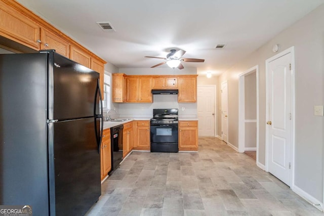 kitchen featuring black appliances, ceiling fan, and sink