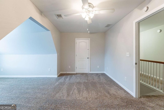 bonus room featuring ceiling fan and carpet floors