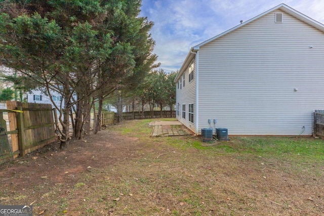 view of property exterior with a patio area