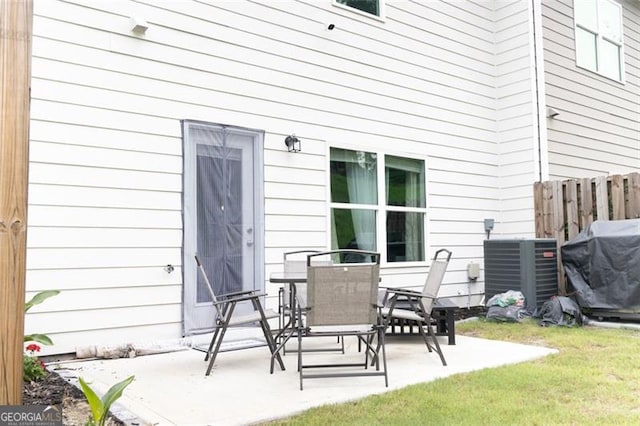 view of patio / terrace with central AC unit and area for grilling