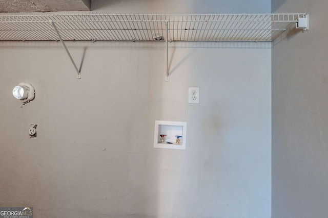 laundry area featuring hookup for an electric dryer and hookup for a washing machine