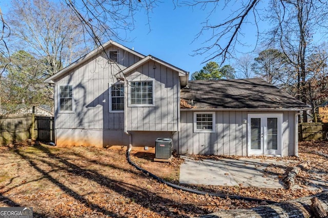 back of property with cooling unit and french doors