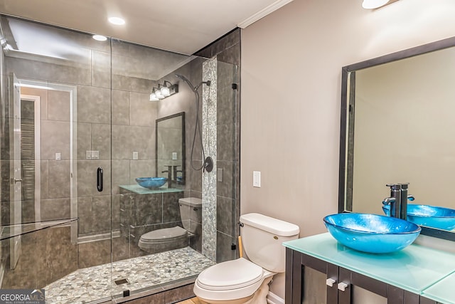 3625 Pointer Rd, Loganville, GA 30052 - full bathroom with toilet, vanity, a stall shower, and crown molding