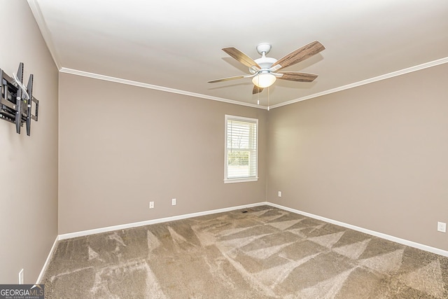 3625 Pointer Rd, Loganville, GA 30052 - carpeted spare room featuring a ceiling fan, crown molding, and baseboards