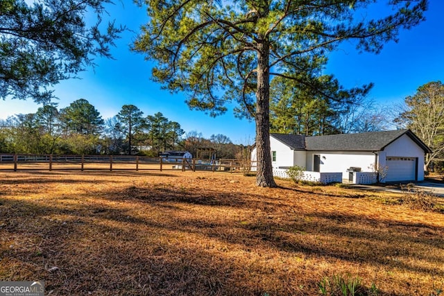 3625 Pointer Rd, Loganville, GA 30052 - view of yard with a garage