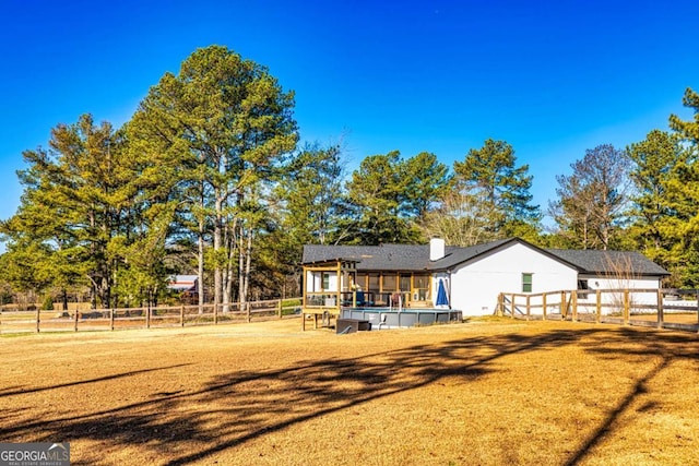 3625 Pointer Rd, Loganville, GA 30052 - view of front of property with a swimming pool and a chimney
