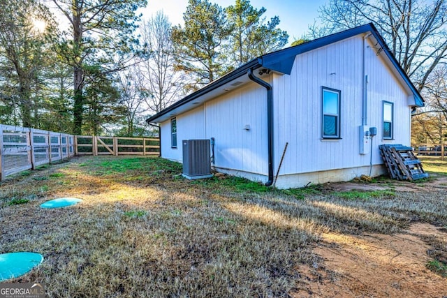 3625 Pointer Rd, Loganville, GA 30052 - view of home's exterior with central AC and a fenced backyard