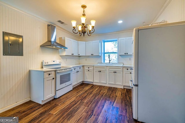 3625 Pointer Rd, Loganville, GA 30052 - kitchen featuring wall chimney range hood, white appliances, electric panel, a chandelier, and dark wood-style flooring