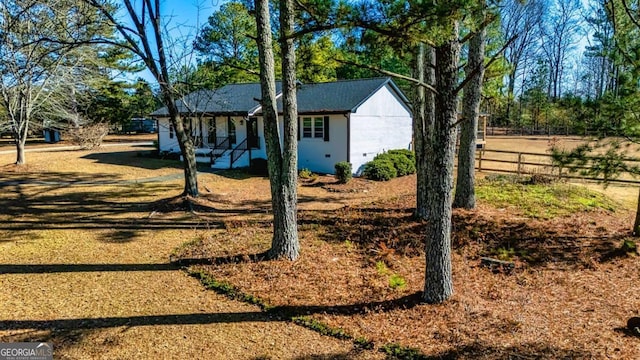 3625 Pointer Rd, Loganville, GA 30052 - view of home's exterior featuring covered porch
