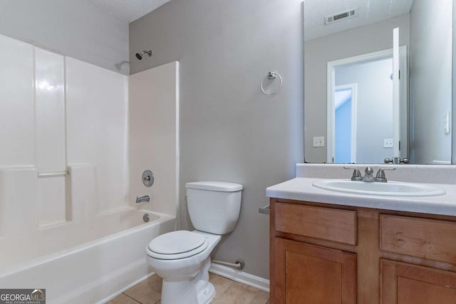 full bathroom featuring vanity, shower / washtub combination, tile patterned flooring, toilet, and a textured ceiling