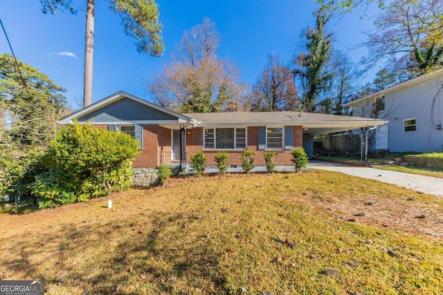 ranch-style house with a front yard and a carport