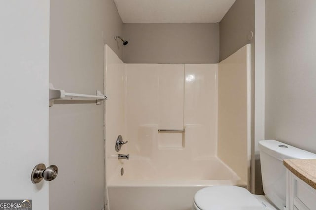 full bathroom featuring shower / washtub combination, vanity, and toilet