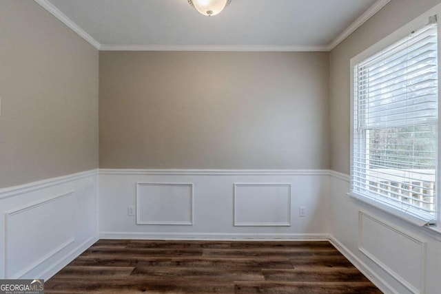 unfurnished room with dark hardwood / wood-style flooring and ornamental molding