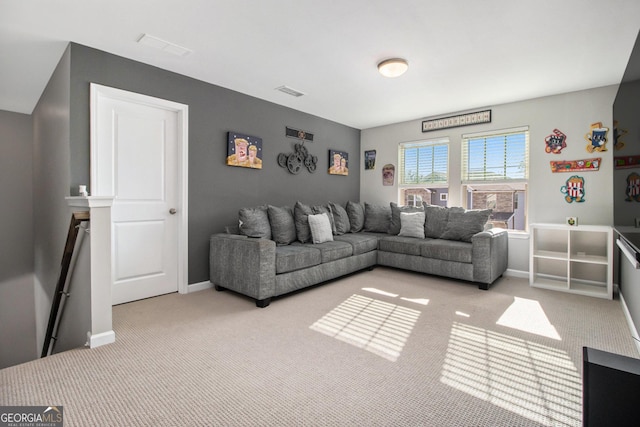 living room featuring light colored carpet