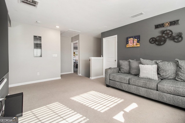 living room featuring light carpet