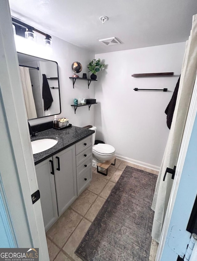 4248 River Green Dr NW Unit 312, Atlanta, GA 30327 - full bath with vanity, toilet, and tile patterned floors