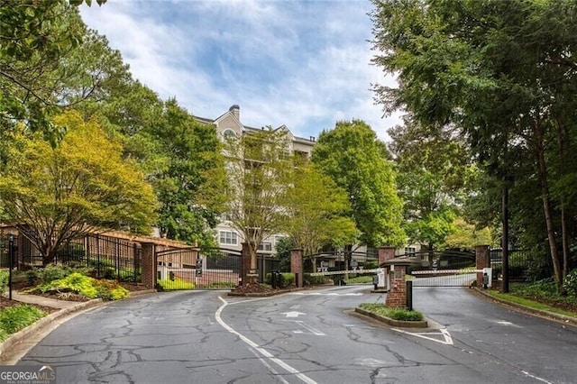 4248 River Green Dr NW Unit 312, Atlanta, GA 30327 - surrounding community featuring a gate and fence