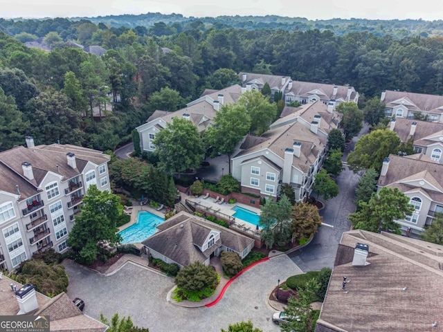 4248 River Green Dr NW Unit 312, Atlanta, GA 30327 - aerial view of residential area with a pool and a forest