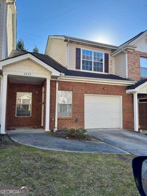 view of front of house with a garage