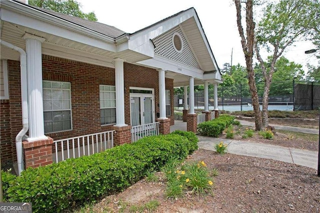 entrance to property with covered porch