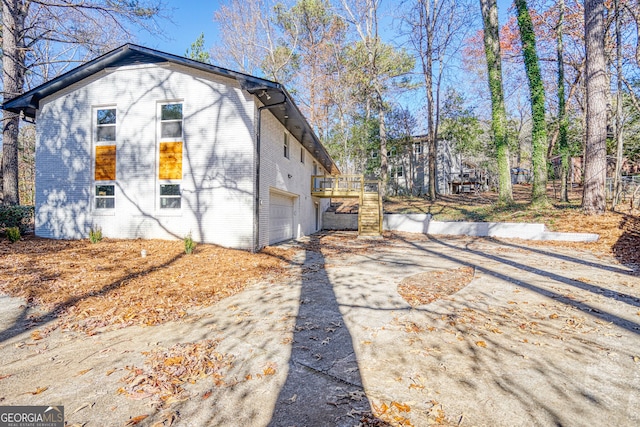 exterior space with a garage