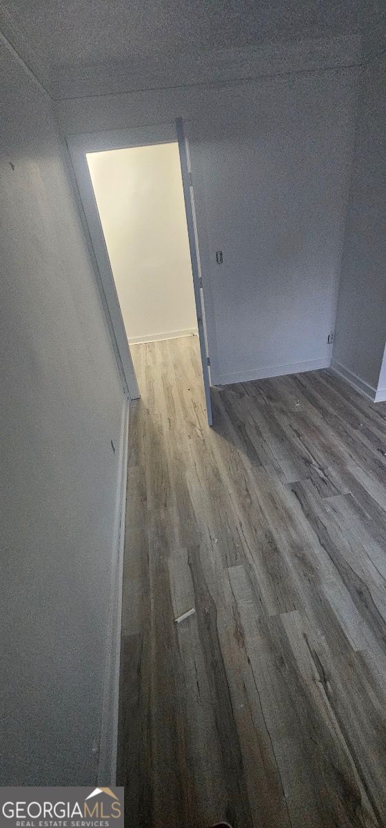 empty room featuring hardwood / wood-style floors