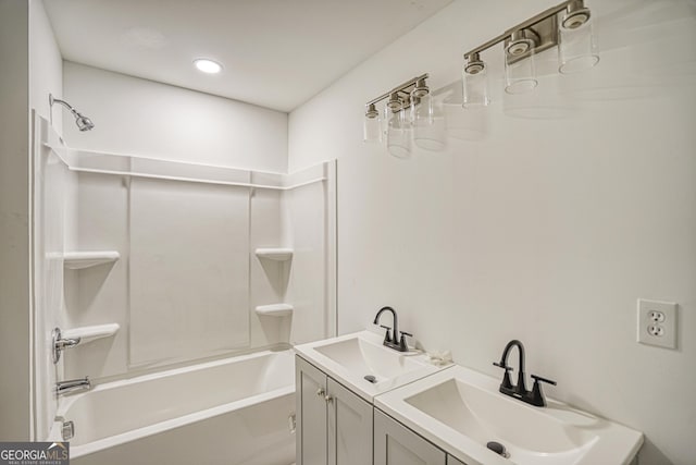 bathroom with vanity and  shower combination