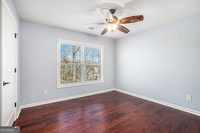 unfurnished room featuring ceiling fan and hardwood / wood-style floors