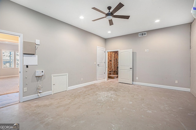 unfurnished bedroom with ceiling fan and concrete floors