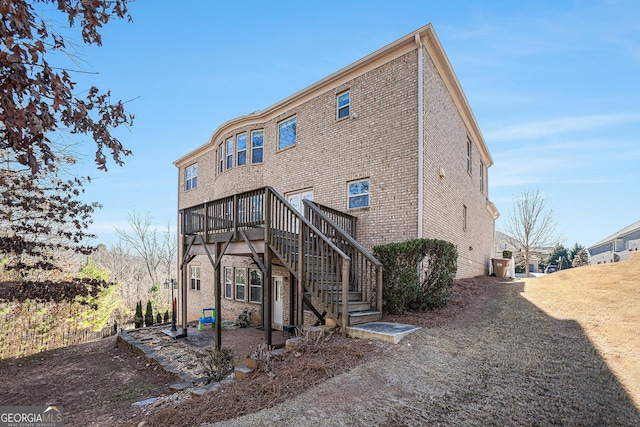 rear view of house with a deck