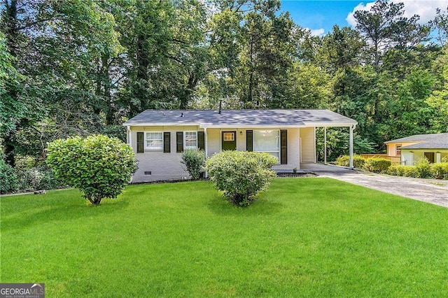 single story home with a carport, a porch, and a front lawn